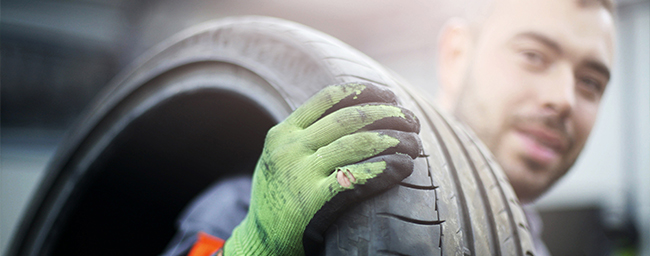 Tire service employee